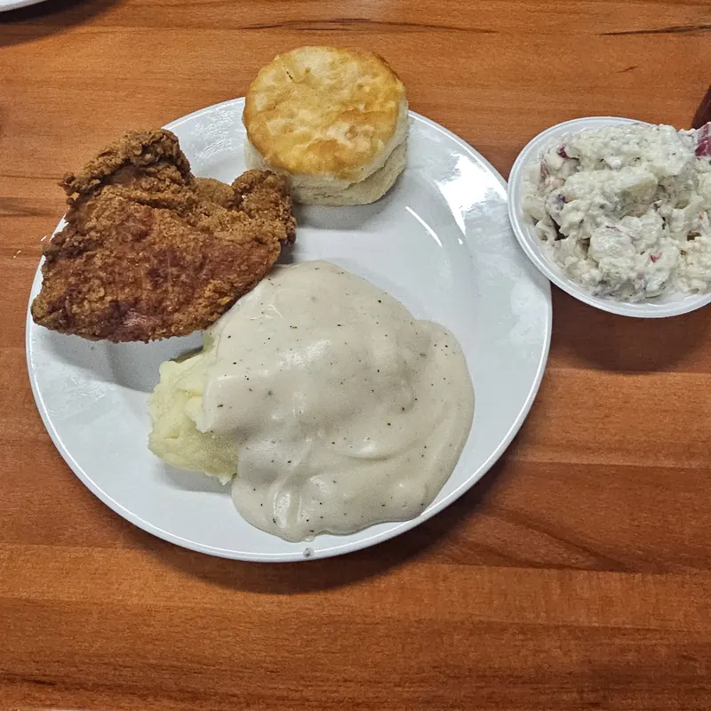 Fried chop, gravy & potatoes