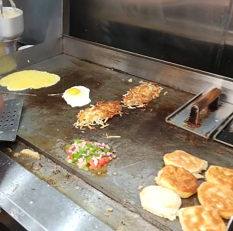 Biscuits and hash browns on the flat-top